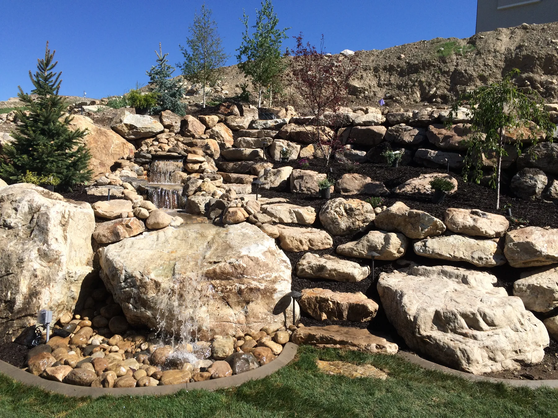 Backyard waterfall and pond water feature
