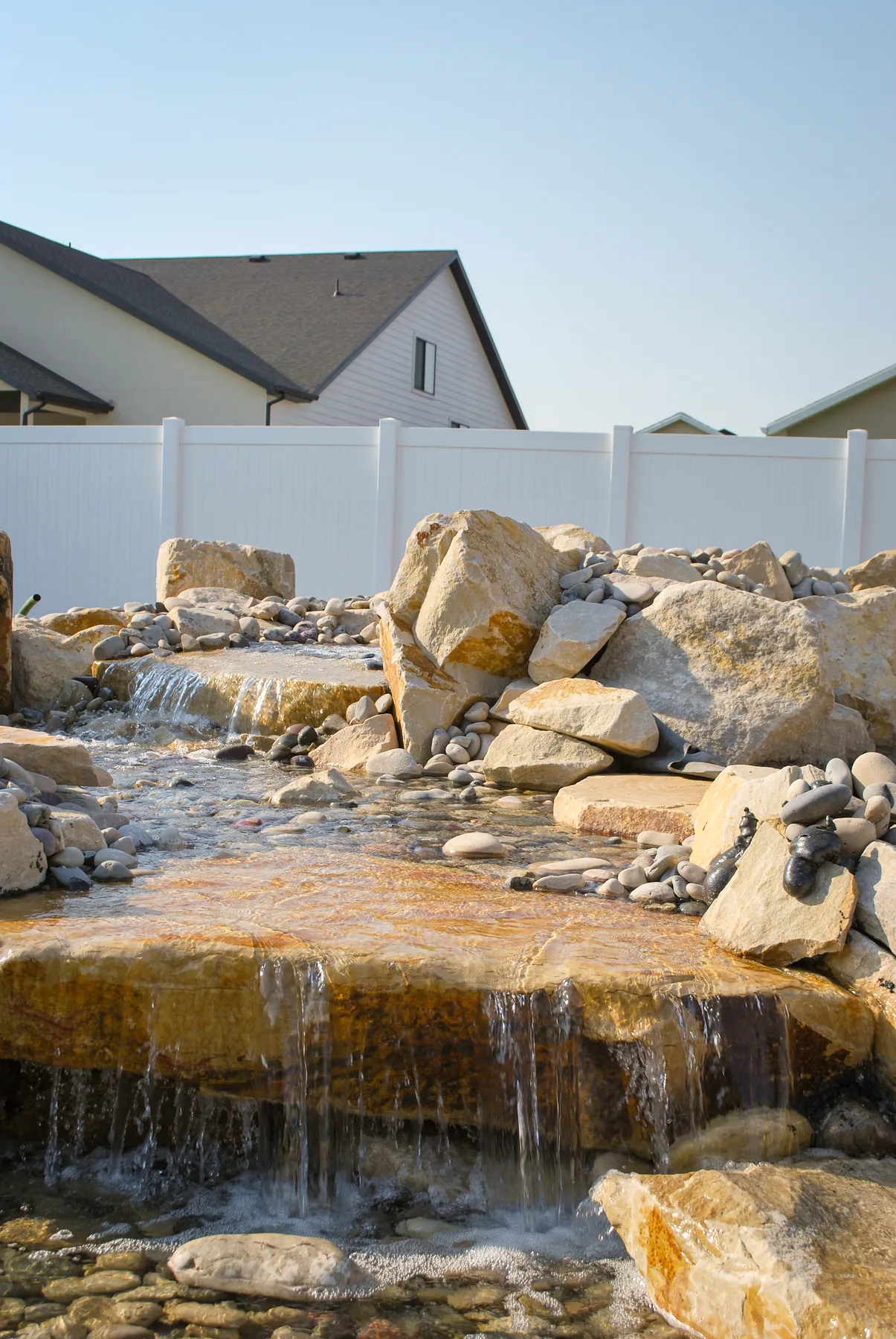Backyard waterfall and pond water feature