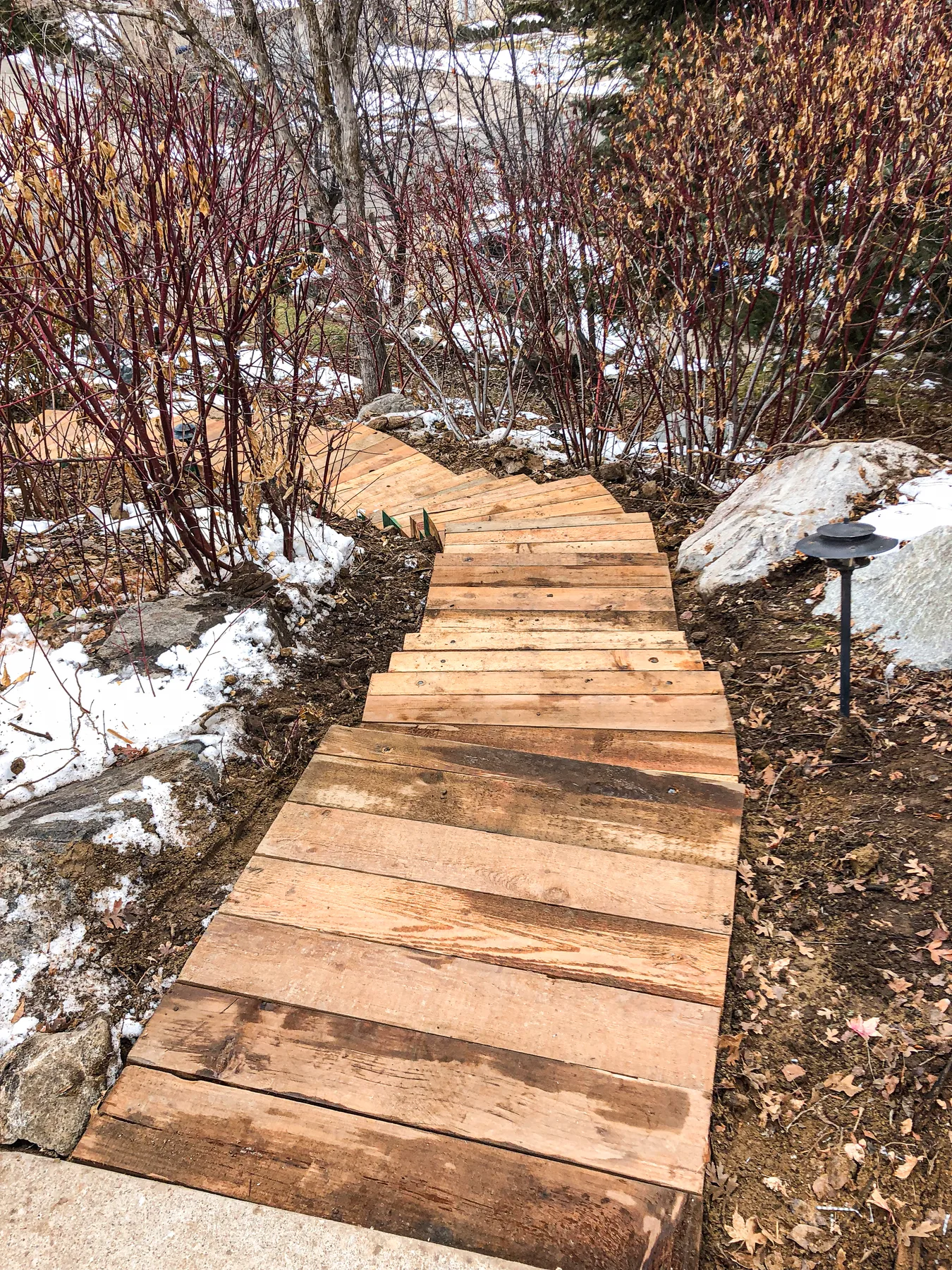 Stone steps and terraced hardscape build