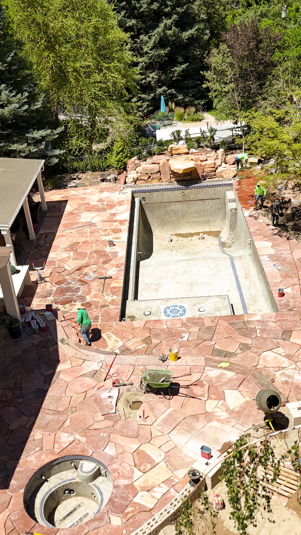 Aerial view of pool and flagstone hardscape build