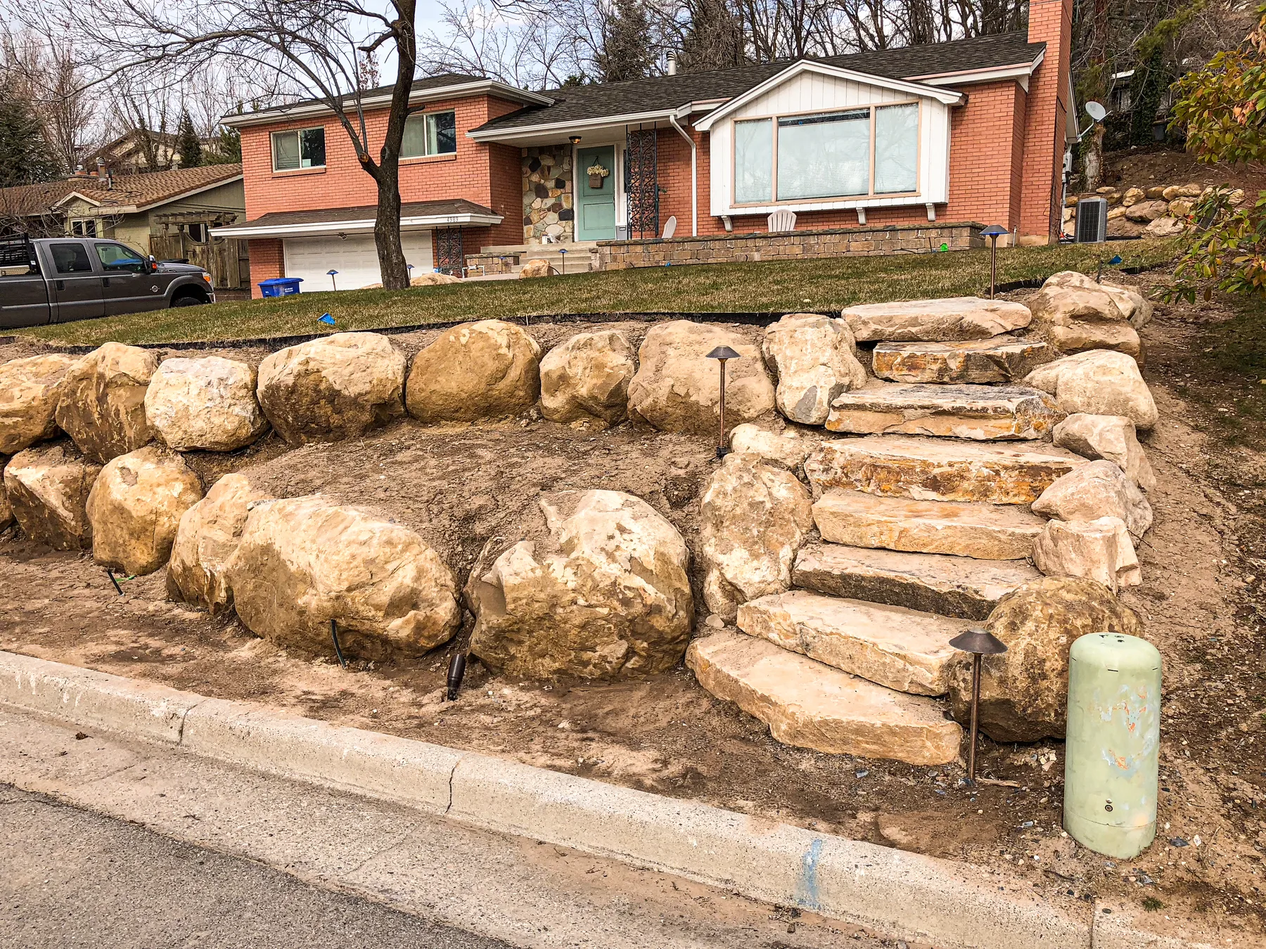 Stone steps and terraced hardscape build