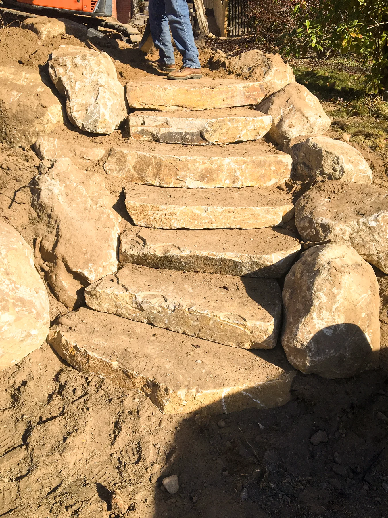 Stone steps and terraced hardscape build