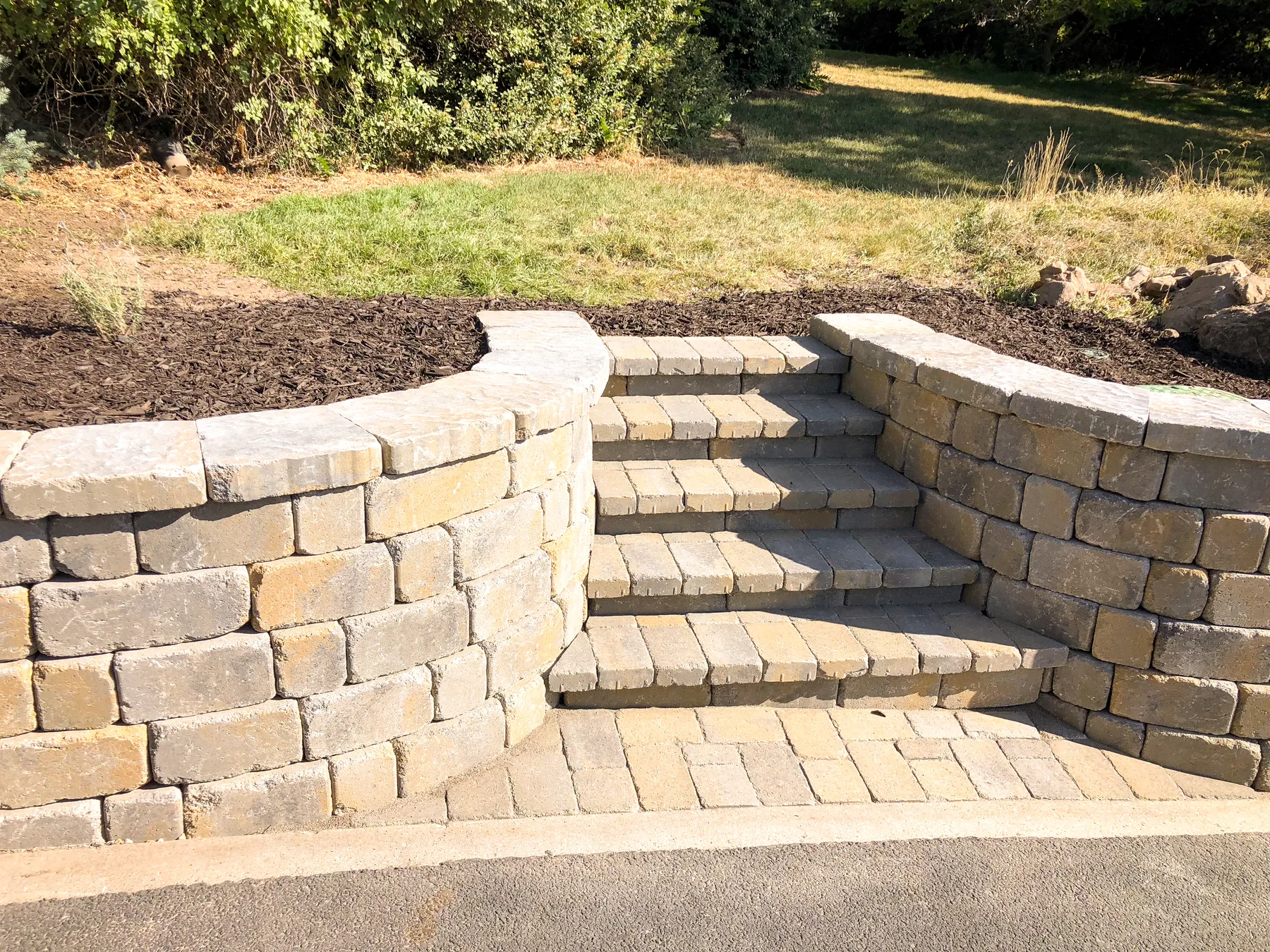 Stone steps and terraced hardscape build