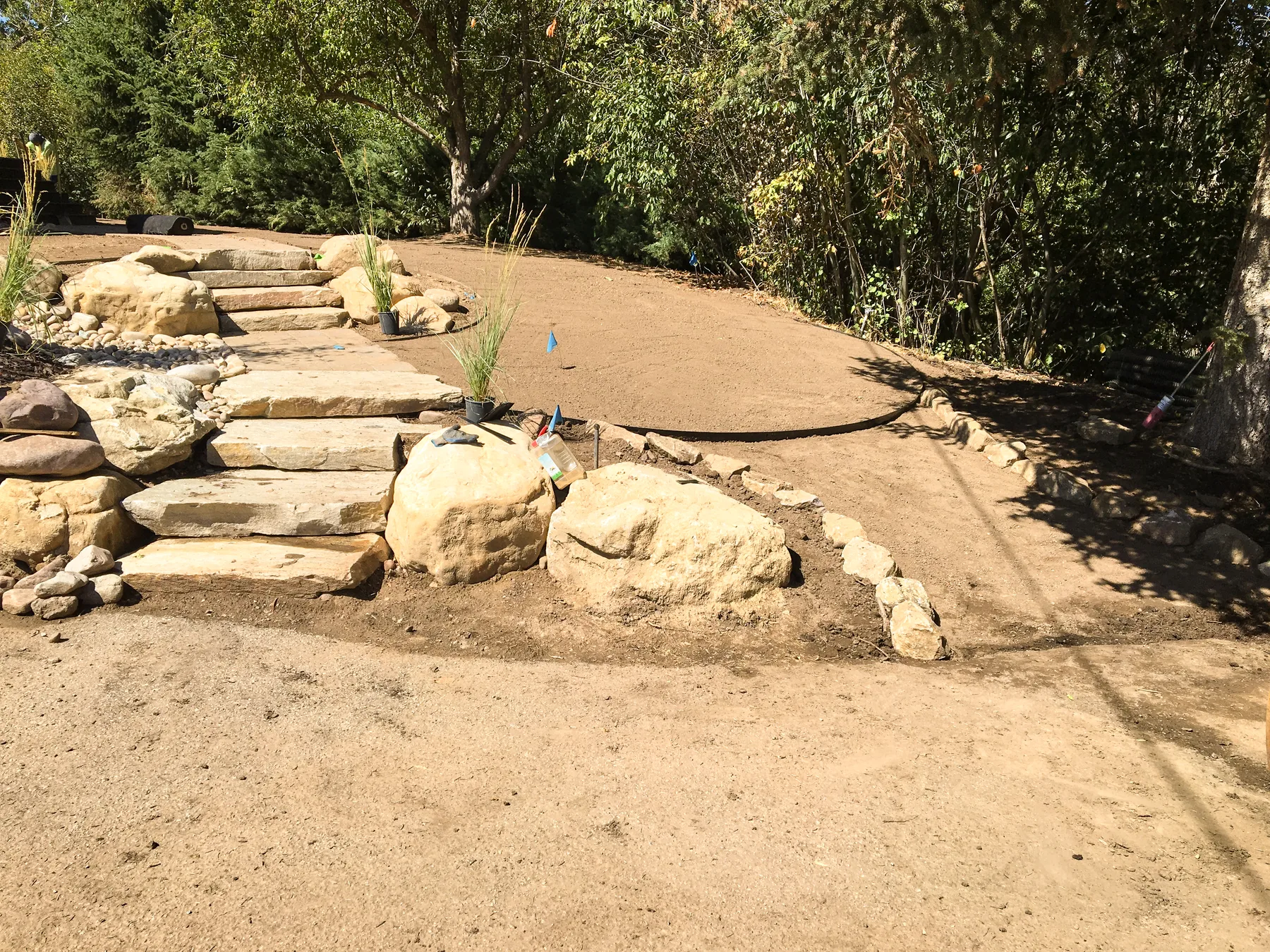 Stone steps and terraced hardscape build